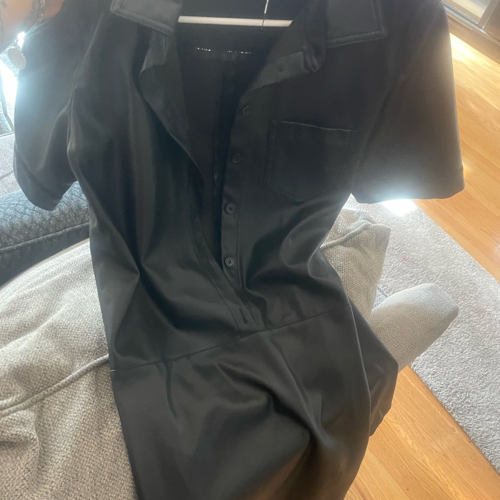 Woman leather black dress very nice dress
